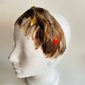 Vintage small duck feather fascinator headband hat.